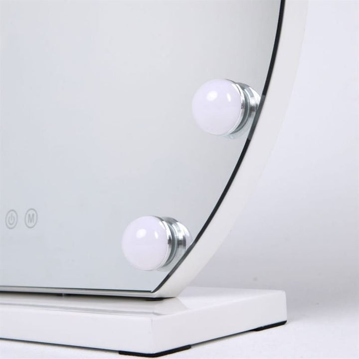 The UNIQ London Round Make-up Mirror features 12 LED bulbs, intuitive touch controls for easy adjustments, and a white base—perfect for flawless makeup application.