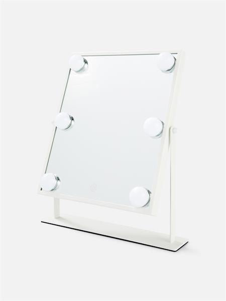 The UNIQ XL Hollywood make-up mirror features a sleek white frame, six LED bulbs, a touch function, and comes mounted on a minimalist white stand.